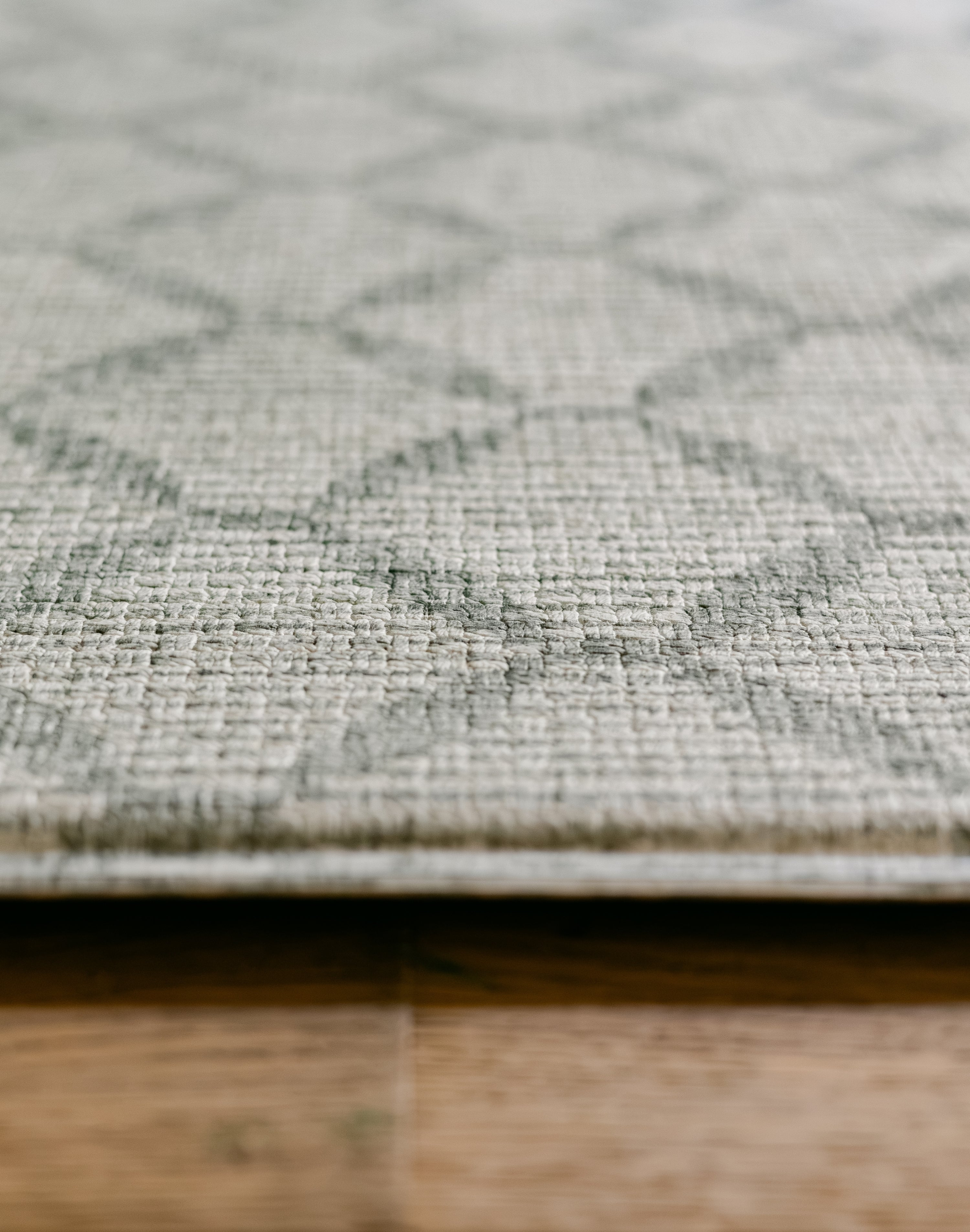 A close up of the thick memory foam, rug-like playmat from totter and tumble | SKU: 26 BEACH/GATHER XL, 26 BEACH/GATHER STD, 26 BEACH/GATHER COMP