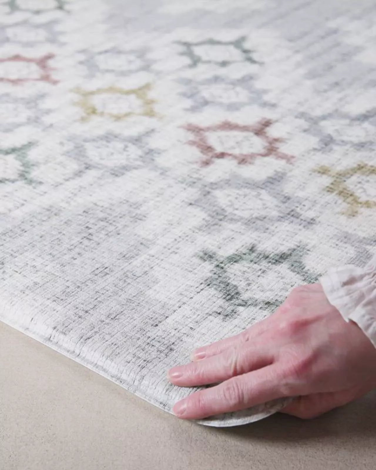 video of 'the rune and the juniper' reversible pink totter and tumble rug-like playmat