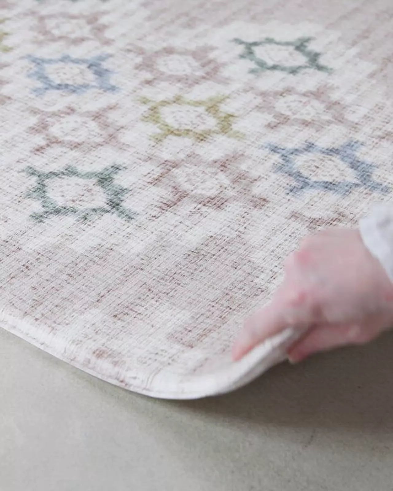 video of 'the fable and the aster' reversible pink totter and tumble rug-like playmat