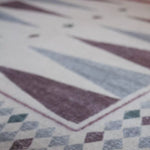 Close-up of The Roller XL reversible memory foam playmat by Totter + Tumble, the largest one piece playmat on the market