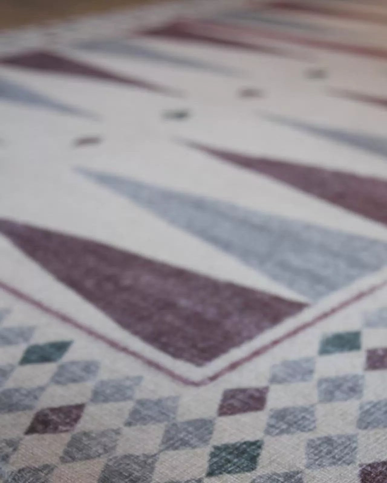 Close-up of The Roller XL reversible memory foam playmat by Totter + Tumble, the largest one piece playmat on the market