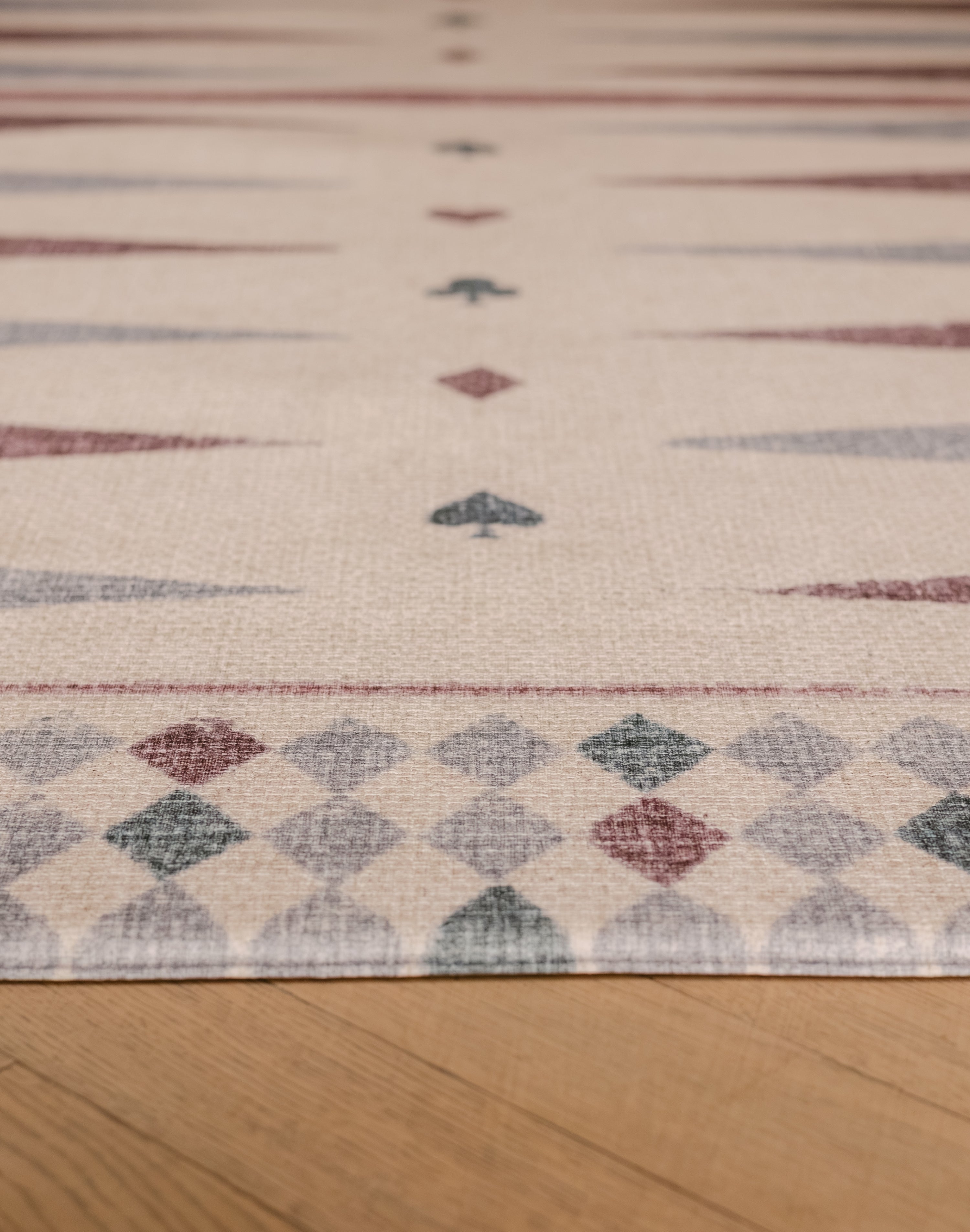 Close-up of The Roller XL reversible memory foam playmat by Totter + Tumble, the largest one piece playmat on the market