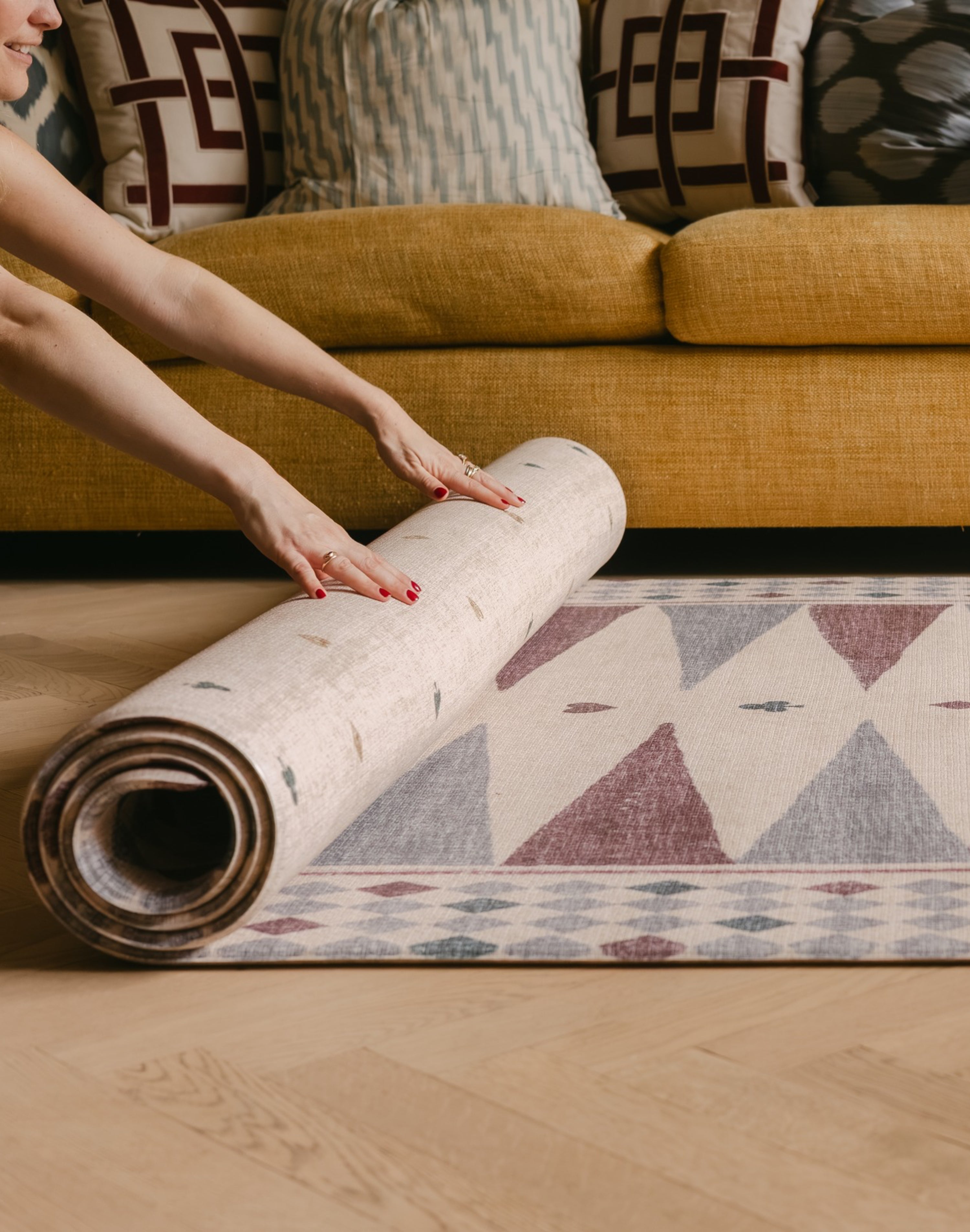 The Roller XL reversible memory foam playmat by Totter + Tumble, the largest one piece playmat on the market rolled with The Wildcard underneath