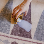Milk spill on The Roller XL reversible memory foam playmat by Totter + Tumble, the largest one piece playmat on the market