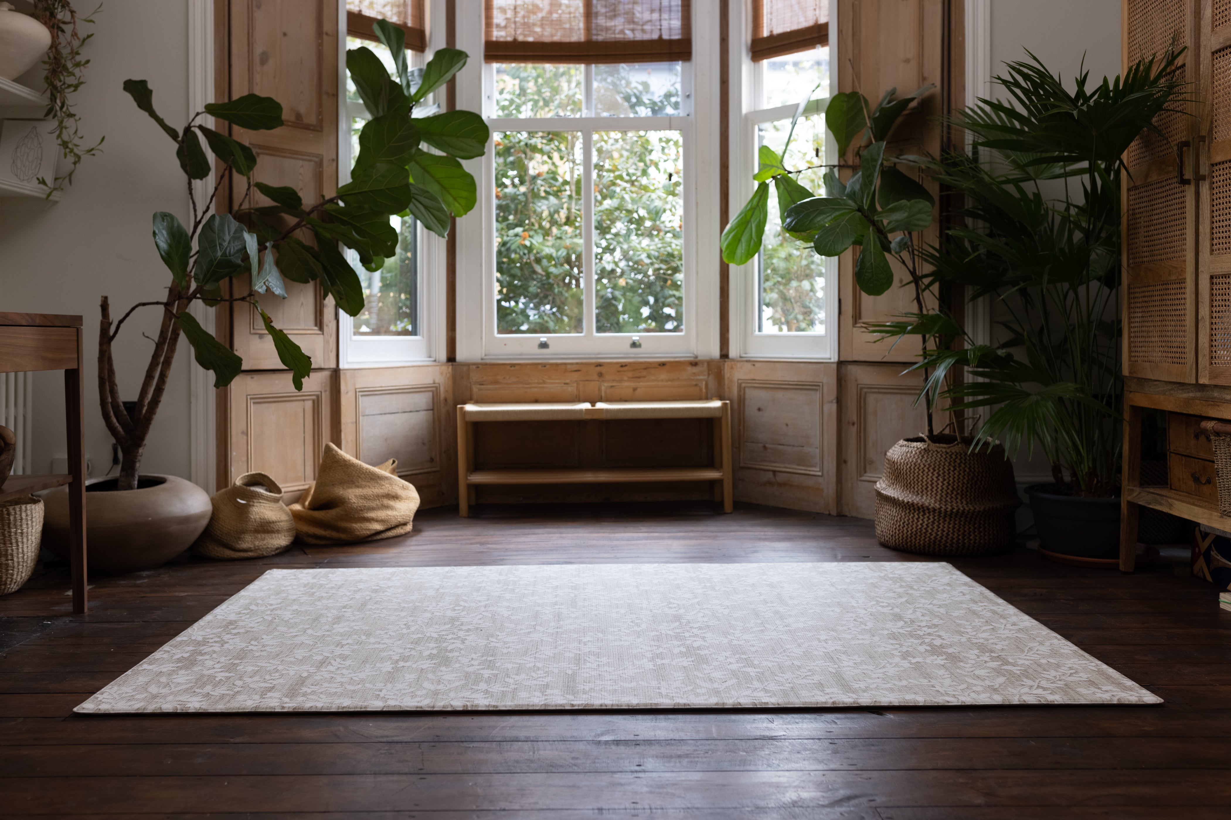 large totter and tumble thick memory foam floral playmat in a living room