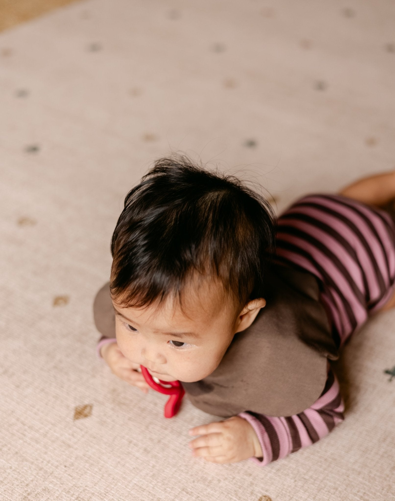 Tummy time on The Wildcard Totter + Tumble reversible memory foam playmat