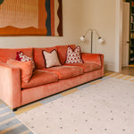 The Wildcard XL reversible memory foam playmat by Totter + Tumble, the largest one piece playmat on the market, in a bright colourful living space