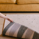The Wildcard Totter + Tumble reversible memory foam playmat rolling back to reveal The Counter 
