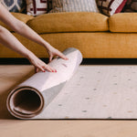 The Wildcard Totter + Tumble reversible memory foam playmat rolling into The Counter