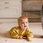 Tummy time on The Wildcard Totter + Tumble reversible memory foam playmat